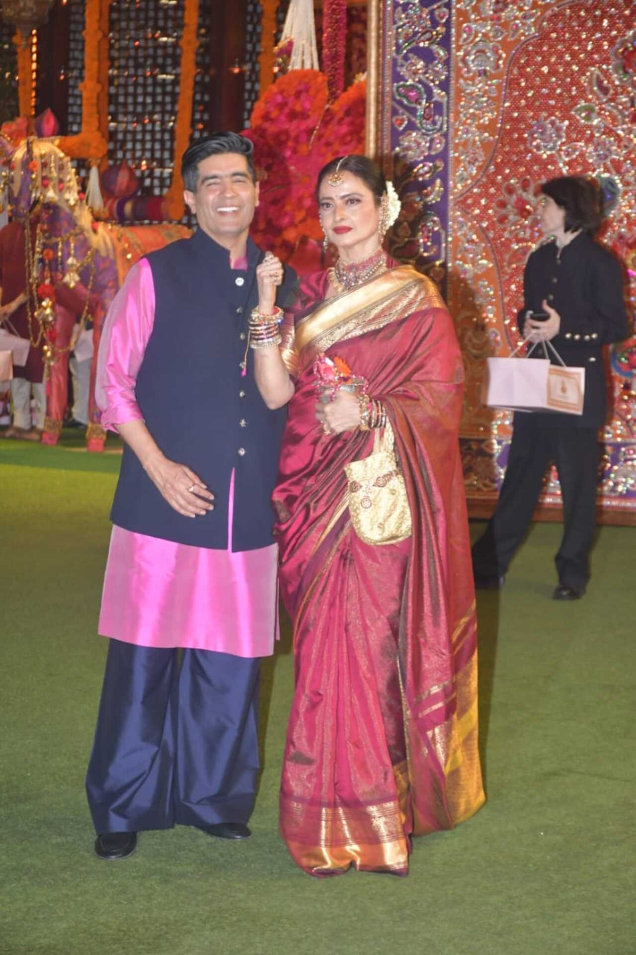Manish Malhotra and Rekha posed for pictures together. The diva looked stunning in a Kanjivaram saree